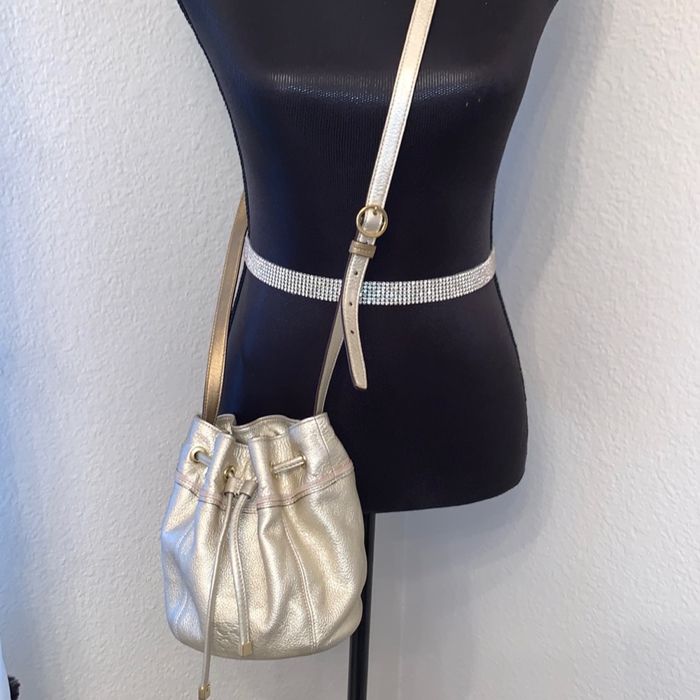 Authentic Coach drawstring crossbody - dusted gold